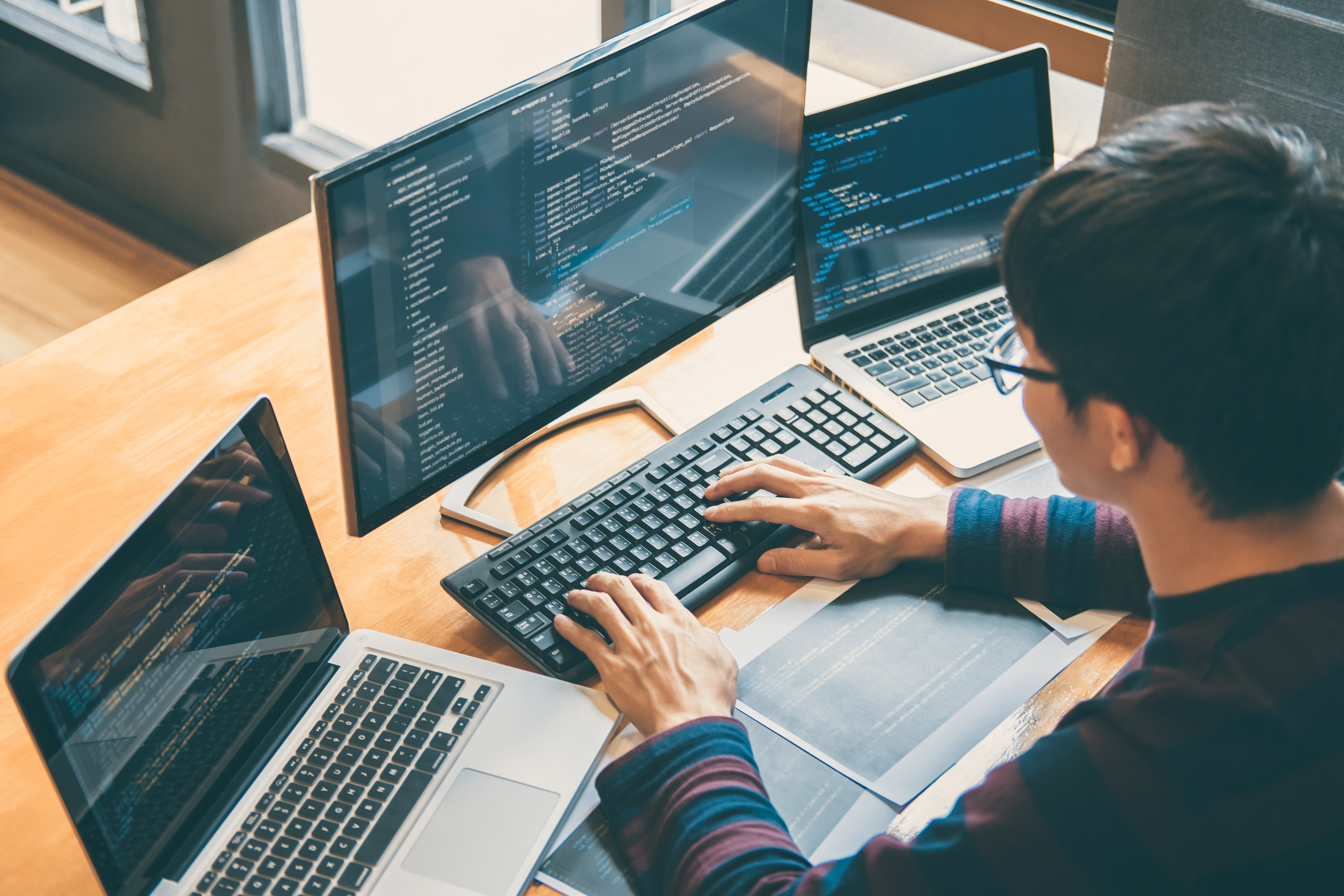 high-angle-view-computer-programmer-working-desk